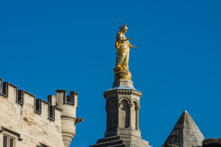Gilded statue of Virgin Mary at Notre-Dame des Doms d'Avignon - cathedral in Avignon, Franceの写真素材