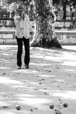 Arles, France - September 2015: Some people plays at bowls at public park. France, 2015のeditorial素材