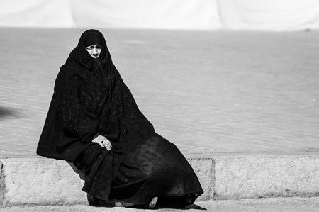 Esfahan, Iran - February 2016 - Muslim woman with traditional chador on the street. Iran, 2016のeditorial素材