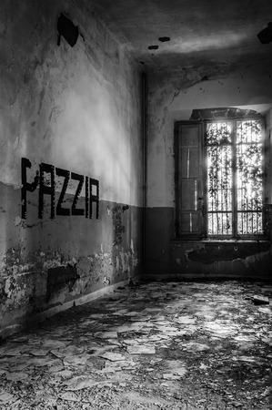 Volterra, Italy - September 2016: Abandoned psychiatric hospital in Volterra. It was home to more than 6,000 mental patients but was shut down in 1978 because its practices were deemed cruel. The hospital was called 'the place of no return' because patienのeditorial素材