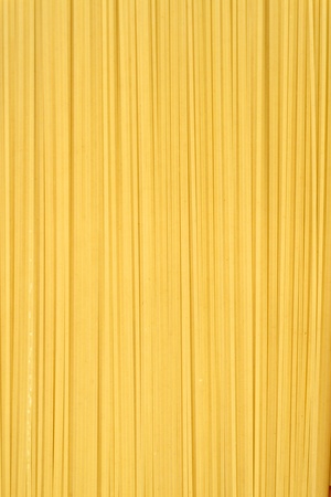Uncooked italian spaghetti backgroundの写真素材