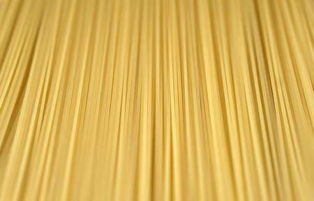 Uncooked italian spaghetti backgroundの写真素材