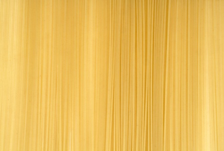 Uncooked italian spaghetti backgroundの写真素材