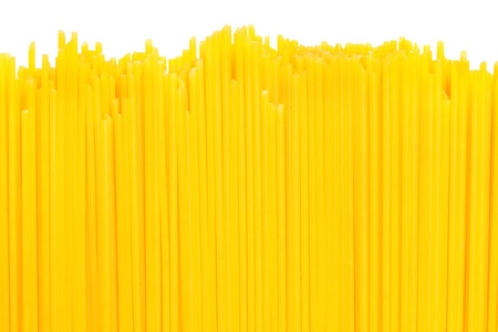 Uncooked pasta on white backgroundの写真素材