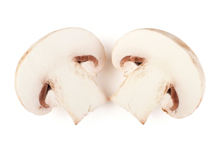 Two sliced champignon mushrooms on white backroundの写真素材