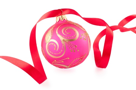 Christmas bauble with a red ribbon on white backgroundの写真素材