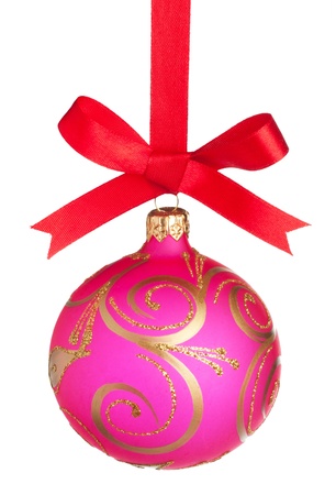 Christmas ball on a red ribbon isolated on whiteの写真素材