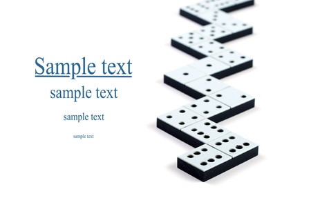 Domino pieces in a line or zigzag on white backgroundの写真素材