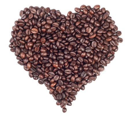 Heart made with coffee beans isolated on whiteの写真素材