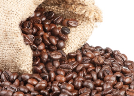 Coffee beans in canvas sack on white backgroundの写真素材