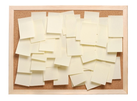 A lot of note papers on a cork boardの写真素材