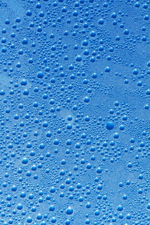 Water drops on a blue backgroundの写真素材