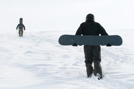 Freeride on snowboard in winter mountainの写真素材