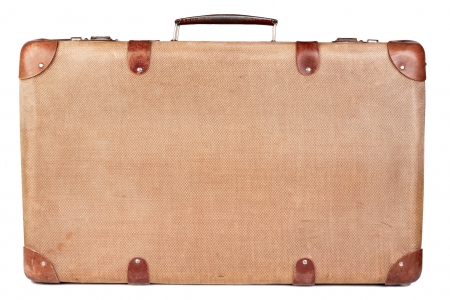 Vintage brown suitcase isolated over white backgroundの写真素材