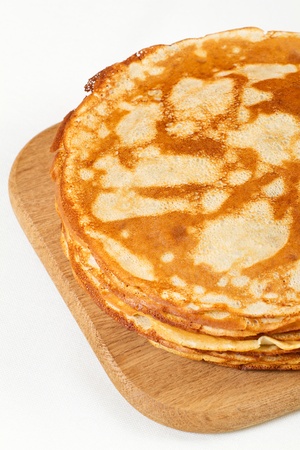 Stack of pancakes isolated on white backgroundの写真素材