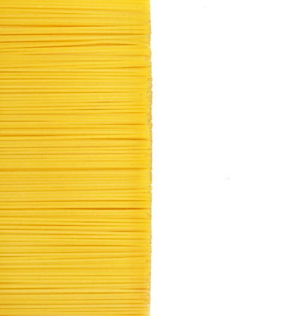 Uncooked pasta on white backgroundの写真素材
