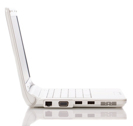 White open laptop with black screen on white backgroundの写真素材