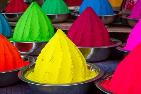 Colorful piles of powdered dyes used for Holi festival in Indiaの写真素材