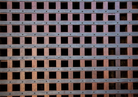 Old wooden closed textured door.metal handle on old wood doorの写真素材