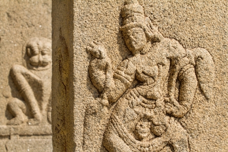 Carved statues in the Hindu temple in Hampi, Karnatakaの写真素材
