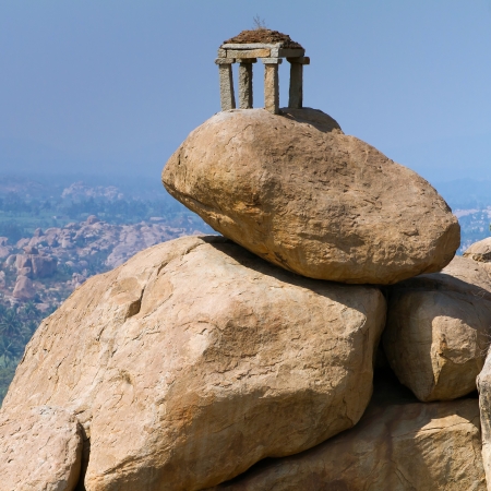 Old temple between stones in Hampi, Karnataka, Indiaの写真素材