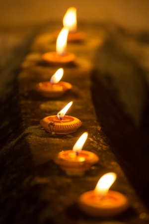 Beautiful oil candles at nightの写真素材