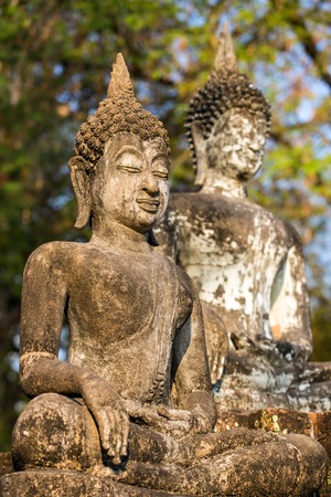 Ancient stone Buddha statues in Sukhothai Historical Park, Thailandの写真素材