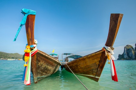 Longtail boats at the tropical beach of Poda island, Andaman sea, Thailandの写真素材