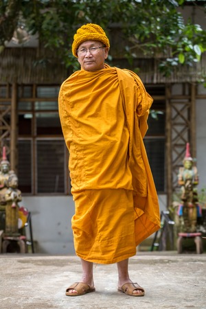 CHIANG MAI, THAILAND - NOVEMBER 30, 2013 : An unidentified Thai Buddhist monks portrait on November 30, 2013 in Chiang Mai, Thailand. There are an estimated 460,000 ordained monks in the Kingdom of Thailand.のeditorial素材
