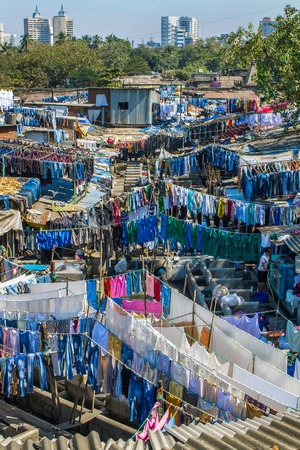 MUMBAI - 12 DECEMBER 2012: People at Dhobi Ghat, the world's largest outdoor laundry on December 12, 2012 in Mumbai, India.のeditorial素材