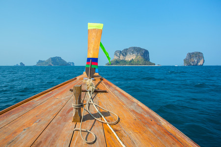 Longtail boat at the tropical beach in Andaman sea, Thailandの写真素材