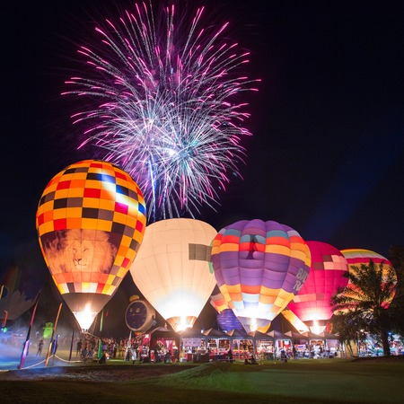 CHIANG MAI, THAILAND - DECEMBER 7, 2014: Hot air balloons at night during Thailand International Balloon Festival in Chiang Mai on December 7, 2014 in Chiang Mai, Thailandのeditorial素材