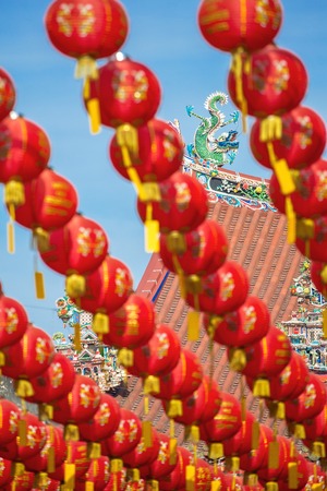 Chinese New Year red and yellow paper lanterns in Kuan Yin Temple, Penang, Malaysiaの写真素材