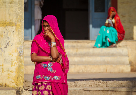 Pushkar, India - December 4, 2012: Indian women dressed in the traditional hindu dress - Sari in...