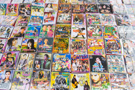Chiang Mai, Thailand - December 11, 2013: Various Thai pop music CD's on the market stall in Chiang Mai, Thailand.のeditorial素材