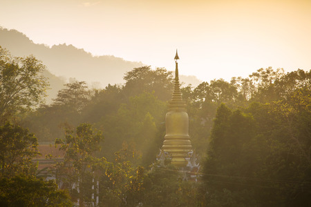Golden stupa in buddhist temple, Thailandの写真素材