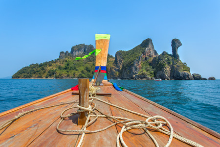 Longtail boat driving to the Chicken island in Andaman sea, Thailandの写真素材