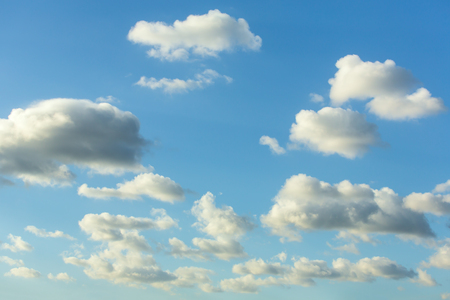 Blue sky with white clouds closeupの写真素材