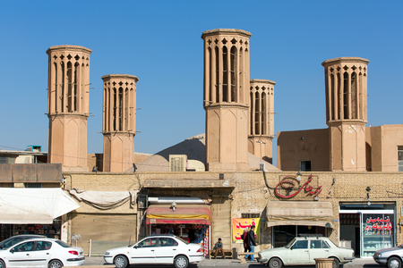YAZD, IRAN - DECEMBER 12: Badgirs, the windcatchers on the roof of an old house on December 12, 2015 in Yazd, Iran. Badgir is a traditional Persian architectural element built on the roof to create natural ventilation inside the buildings.のeditorial素材