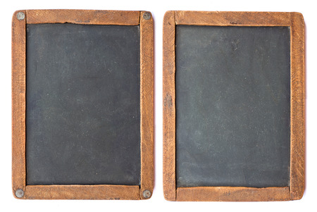 Vintage slake blackboard isolated on white. Two sides of one board.の写真素材