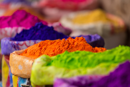 Colorful piles of powdered dyes used for Holi festival in Indiaの写真素材