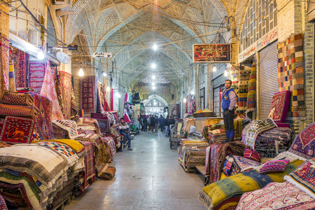 Shiraz, Iran - December 24, 2015: Traditional iranian carpets shop in Vakil Bazaar, Shiraz, Iran. Vakil Bazaar is the most important tourist attraction in Shiraz, Iran.のeditorial素材