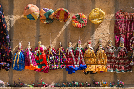 Souvenir Rajasthan puppets hanging in the street shop of Jodhpur, Indiaのeditorial素材