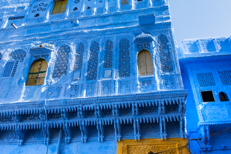 Traditional blue windows and wall in Blue City Jodhpur, India.の写真素材