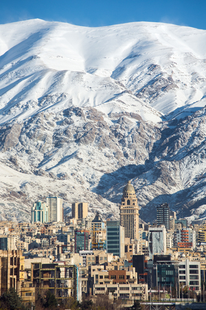 Winter Tehran  view with a snow covered Alborz Mountains on backgroundの写真素材