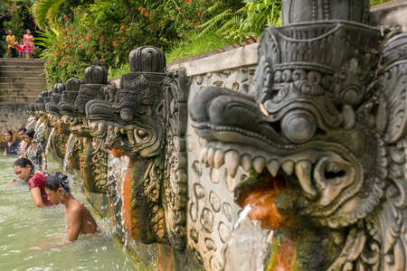 Bali, Indonesia - August 9, 2016: People take a bath in thermal Banjar Tega hot springs in Bali, Indonesiaのeditorial素材