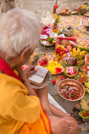 Kathmandu, Nepal - May 21, 2016: Brahmin make hindu puja ceremony in Kathmandu, Nepalのeditorial素材