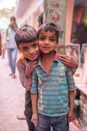 Barsana, India - March 17, 2016: Kids celebrate Lathmar Holi in Barsana village, Uttar Pradesh, India.のeditorial素材