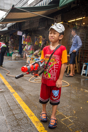 Bangkok, Thailand - April 13, 2014 : The Songkran festival or Thai New Year's festival in JJ market in Bangkok, Thailand.のeditorial素材