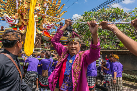 Bali, Indonesia - August 20, 2016: Balinese people participating in royal cremation ceremony in Ubud, Bali.のeditorial素材
